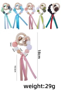 Detailed size chart for baby wooden teething rings with colorful silicone beads