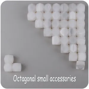 Detailed view of 14mm octagonal white silicone beads for DIY baby teething jewelry