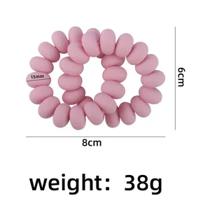 Pink spiral silicone baby teether bracelet, dimensions 8x6cm with 15mm thick coil