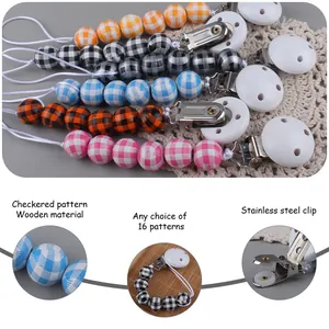 Detail of baby pacifier clip with plaid wooden beads and durable stainless steel buckle