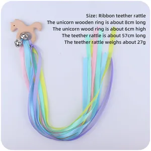 Unicorn wooden baby teether rattle with colorful ribbons and metal bells for sensory play