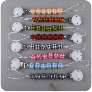 Detailed set of 8 pacifier clips with colorful checkered beads and plastic clips