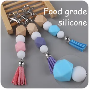 DIY tassel keychain with food grade silicone beads and natural wood geometric accents