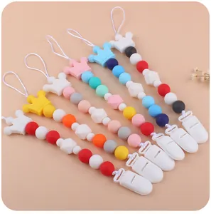Close-up of silicone crown pacifier clips in six colors with beads and clips