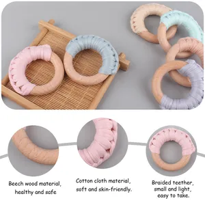 Beech wood and woven cotton baby teether rings in assorted soft macaron colors