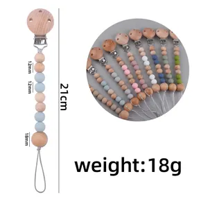 Detaillierte Größentabelle für Schnullerkette aus Silikon und Buchenholz mit 21cm Länge