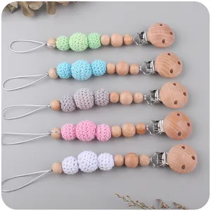 Handmade beech wood and crochet cotton bead baby pacifier clip set in five soft colors