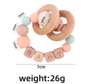 Detail view of silicone beads and beech wood teething bracelet with dimensions and weight
