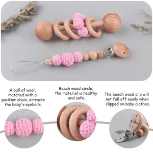 Handmade beech wood baby rattle and pink crochet bead pacifier clip set for soothing