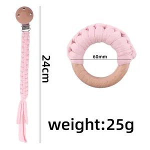 Attache-tétine rose en coton tressé de 24cm et un anneau de dentition en hêtre 60mm