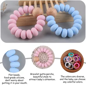 Dettaglio delle perline in silicone alimentare e dell'anello da dentizione in faggio