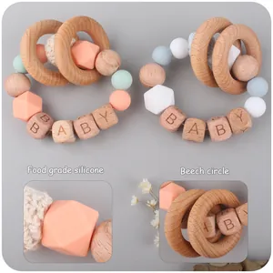 Beech wood and food-grade silicone baby teething rattle rings with DIY letter beads