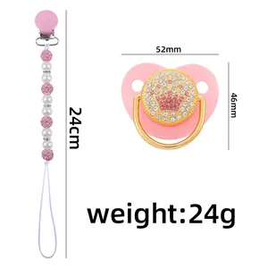 Pink crown pacifier set with matching rhinestone and pearl clip for infant soothing