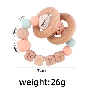 DIY baby teether rattle toy with beech wood rings, silicone beads, and crochet ball