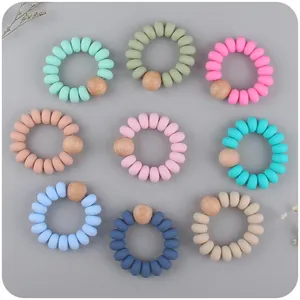 Bracciale Massaggiagengive in Silicone per Neonati Con Perla in Legno di Faggio Naturale Senza BPA Giocattolo Sensoriale