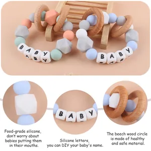 Silicone baby teether rattle with beech wood rings and DIY name beads in morandi colors