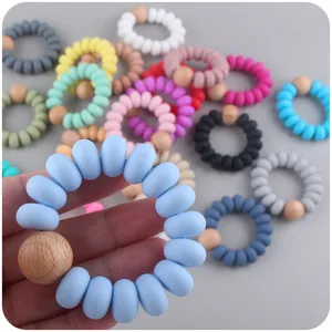 Anello da dentizione in silicone colorato e legno di faggio, gioco sensoriale neonato