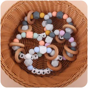 Silicone and wooden baby teething bracelet set with pastel macaron colored hexagon beads