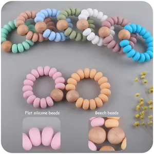 Braccialetto da dentizione per neonati in silicone e faggio con perle piatte lenitive
