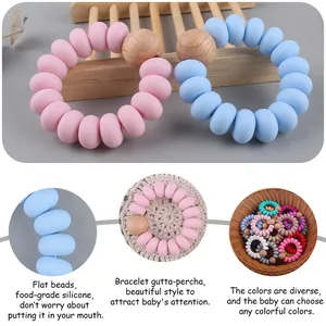 Braccialetto massaggiagengive in silicone e faggio con perle piatte colorate per bebè