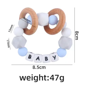 Silicone and wood baby teething ring with blue and marble beads and BABY letter charms