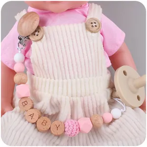 Sujeta chupete de silicona y madera de haya con cuentas para bebé y chupete beige