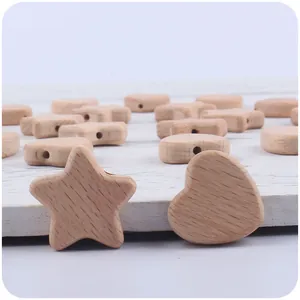 Natural beech wood teething beads in star and heart shapes for DIY pacifier clips