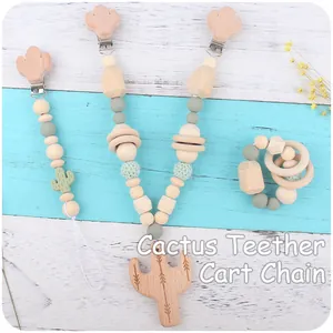 Detail of cactus teether stroller chain with beech wood clips and silicone beads