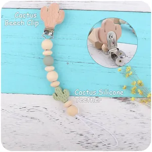 Close-up of beech wood cactus clip and silicone teether for baby pacifier chain