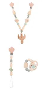 Detail of baby teething set with beech wood cactus clip, silicone beads and crochet rattle