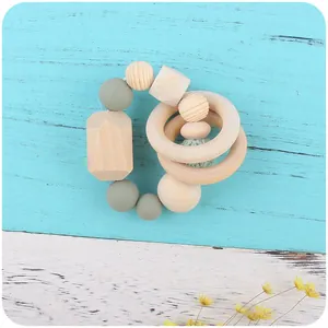 Handmade beech wood and silicone baby teether rattle set with cactus clip in morandi green