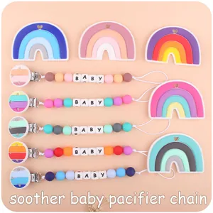 Detailed set of silicone baby pacifier clips featuring rainbow beads and BABY lettering