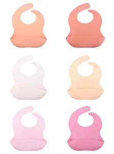 Soft silicone baby bibs with adjustable neck buckles and deep food catcher pockets