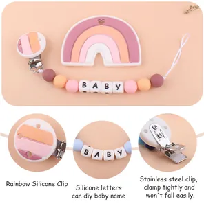 Detail view of rainbow silicone baby pacifier clip with personalized letter beads