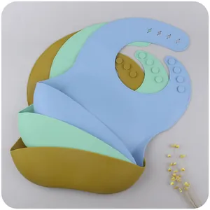 Adjustable waterproof silicone baby bibs set in soft blue, green and yellow colors