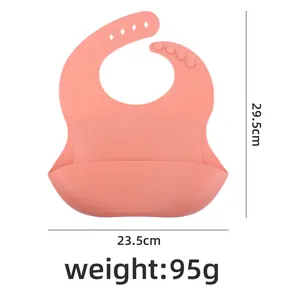 Pink silicone baby bib with adjustable neck strap and food catcher, 29.5x23.5cm size