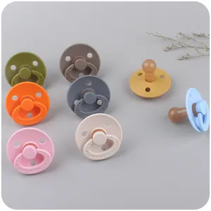Lot de sucettes en silicone multicolores avec clips en bois et boucliers ventilés