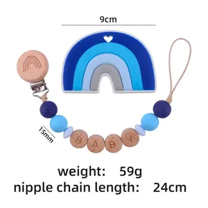 Blue silicone rainbow teether and beech wood pacifier clip set for infants
