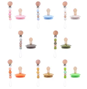 Set of silicone pacifiers with beech wood bead clips in eight pastel colors