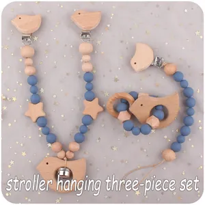 Dreiteiliges Kinderwagen-Spielset mit Holzvogel, Sternen und dunkelblauen Silikonperlen