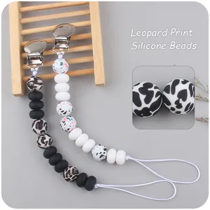 Leopard print silicone bead baby pacifier clips with metal fasteners and braided cord