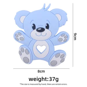 Light blue bear silicone baby teether with heart cutout and paw details on white background