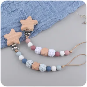 Handmade wooden star pacifier clip set with silicone and crochet beads for infants