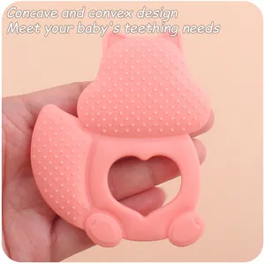 Pink squirrel baby teether showing textured silicone surface for soothing gums