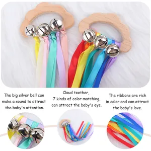 Cloud-shaped beech wood baby teether toy with colorful ribbons and silver bells