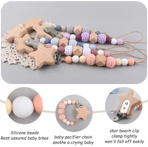 Detail of star-shaped beech wood clip and food-grade silicone teething beads set
