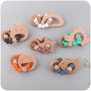 Handgefertigtes Set aus Buchenholz und Silikon Beißringen mit Tiermotiven für Babys