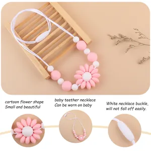 Silicone flower teething necklace for babies with safety clasp and pink beads