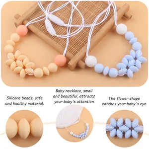 Collana dentizione neonato in silicone fatta a mano con fiori arancio e blu