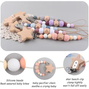 Star-shaped beech wood and silicone bead pacifier clip for baby teething in various colors